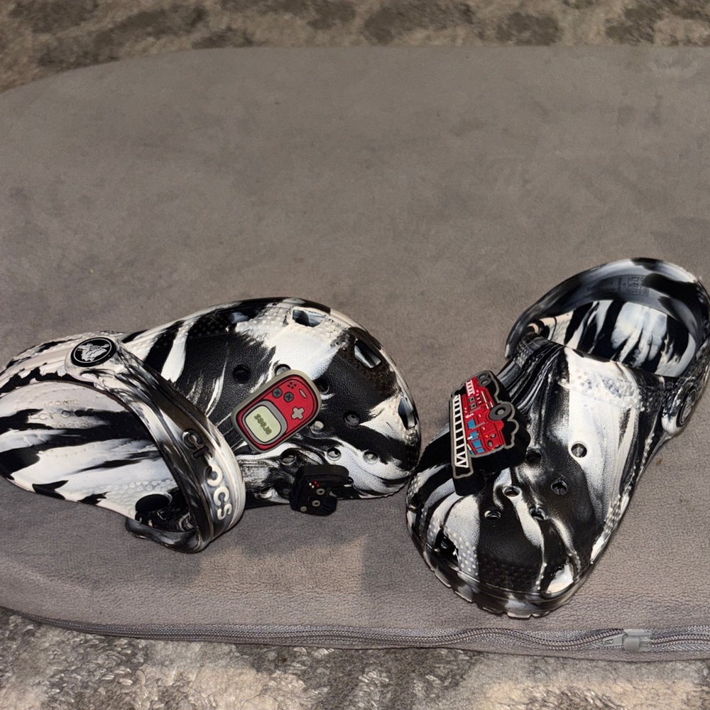 CROCS Black and White Clogs with Charms